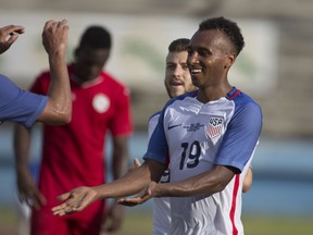 FILE - In this Oct. 7, 2016, file photo, Julian Green, of the U.S., celebrates scoring the second and final goal against Cuba during a friendly soccer match in the Pedro Marrero Stadium in Havana, Cuba. Green returns to the U.S. national team for the first time in two years, joining star midfielder Christian Pulisic on a young American roster for a May 28, 2018, exhibition against Bolivia at Chester, Pa.