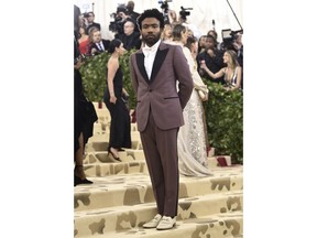 Childish Gambino attends The Metropolitan Museum of Art's Costume Institute benefit gala celebrating the opening of the Heavenly Bodies: Fashion and the Catholic Imagination exhibition on Monday, May 7, 2018, in New York.