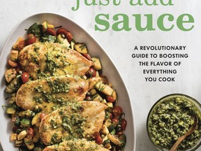 This undated photo provided by America's Test Kitchen shows the cookbook "Just Add Sauce." (America's Test Kitchen via AP)