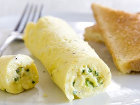 This undated photo provided by America's Test Kitchen shows the Perfect French Omelet in Brookline, Mass. This recipe appears in "Cooking at Home with Bridget & Julia."