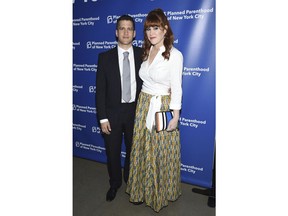 Panio Gianopoulos, left, and Molly Ringwald attend the Planned Parenthood Benefit Gala at Spring Studios on Tuesday, May 1, 2018, in New York.