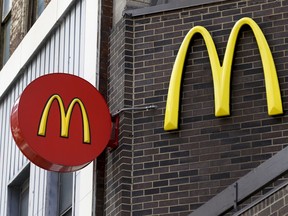 FILE- This April 24, 2017, photo shows the outside of a McDonald's restaurant in downtown Pittsburgh. McDonald's isn't ready to stop offering plastic straws, despite environmental concerns. A shareholder proposal to pressure the world's biggest hamburger chain on the matter was voted down at the company's annual meeting Thursday, May 24, 2018.