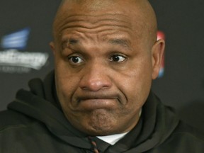 FILE - In this Dec. 17, 2017 file photo, Cleveland Browns head coach Hue Jackson answers questions during a news conference after the Baltimore Ravens defeated his team in an NFL football game, in Cleveland.  Jackson is making good on his promise to jump into Lake Erie. Jackson announced Monday, May 14, 2018, that he will take a dip into the chilly water on June 1 for charity. Last season, Jackson vowed that if the Browns didn't improve on their 1-15 record from 2016 - his first season - that he would jump into the lake. Cleveland went 0-16 and Jackson is keeping his word.