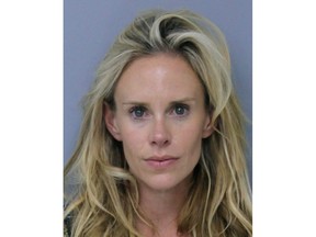 This Saturday, May 12, 2018 booking photo provided by St. Johns County, Florida, Sheriff's Office shows Krista Glover, the wife of former U.S. Open champion Lucas Glover.  She was arrested on charges related to domestic violence during the weekend of The Players Championship. (St. Johns County, Florida, Sheriff's Office via AP)