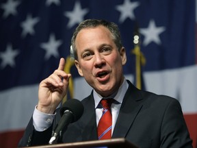 FILE - In this Nov. 3, 2010 file photo, New York Attorney General-elect Eric Schneiderman gestures while giving his victory speech just past midnight in New York. A New York lawyer said he told President Donald Trump's attorney, Michael Cohen, years ago that Schneiderman was abusing women. Schneiderman, a frequent legal nemesis of the president, resigned this week after The New Yorker published the accounts of four women who said they were slapped and choked by the Democrat.