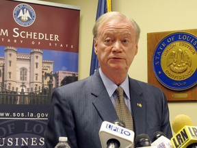 FILE - In this March 14, 2018, file photo, Louisiana Secretary of State Tom Schedler, accused in a lawsuit of sexually harassing one of his employees, speaks at a press conference in Baton Rouge, La. Schedler announced Tuesday, May 1, 2018, that he will be stepping down May 8 from the position he's held since 2010. He becomes the highest-level public official in Louisiana to be felled by sexual misconduct accusations since the #MeToo movement began.
