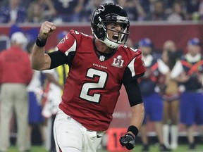 FILE - In this Feb. 5, 2017, file photo, Atlanta Falcons' Matt Ryan celebrates after a touchdown during the second half of the NFL Super Bowl 51 football game against the New England Patriots in Houston. Ryan has agreed to a five-year contract extension with the Falcons, the team announced Thursday, May 3, 2018,  without revealing terms.