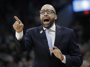 FILE - In this April 25, 2017, file photo, Memphis Grizzlies head coach David Fizdale directs his players during the first half of Game 5 in a first-round NBA basketball playoff series against the San Antonio Spurs in San Antonio. A person with knowledge of the details said Thursday, May 3, 2018, that the New York Knicks have agreed to hire Fizdale as their new coach. The former Grizzlies coach will replace Jeff Hornacek, who was fired last month after two seasons.
