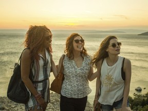 This image released by Netflix shows, from left, Phoebe Robinson, Vanessa Bayer and Gillian Jacobs in a scene from "Ibiza."