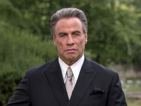 This image released by Vertical Entertainment shows John Travolta as John Gotti from the mobster biopic "Gotti." The film will premiere at Cannes as a special gala screening at the Palais des Festivals on May 15. The Cannes Film Festival begins May 8.