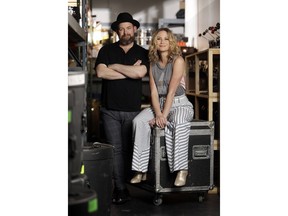 In this May 5, 2018, photo, Jennifer Nettles, right, and Kristian Bush of the country duo Sugarland pose in Nashville, Tenn., to promote their new album, "Bigger," out on June 8.