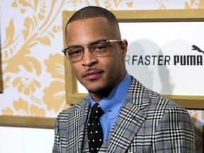 FILE - In this Jan. 27, 2018 file photo, T.I. attends the Roc Nation pre-Grammy brunch in New York. Police say rapper T.I. has been arrested for disorderly conduct and public drunkenness as he tried to enter his gated community outside Atlanta. Henry County Police Deputy Mike Ireland said T.I. was arrested around 4:30 a.m. Wednesday, May 16, after he got into an argument with a security guard. Media reports say the rapper, whose real name is Clifford Harris, lost his key and the guard wouldn't let him into the community.