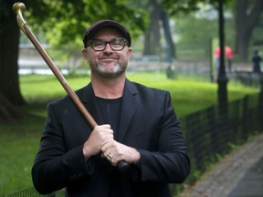 In this May 16, 2018 photo, retired Navy SEAL James Hatch poses with his walking cane in New York. Hatch is the author of "Touching the Dragon: And Other Techniques for Surviving Life's Wars," which was released on Tuesday.