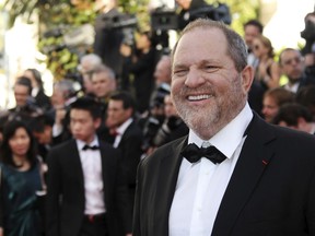 FILE - In this May 16, 2012 file photo producer Harvey Weinstein arrives for the opening ceremony and screening of Moonrise Kingdom at the 65th international film festival, in Cannes, southern France. The 71st Cannes Film Festival, which begins Tuesday, finds itself, unlike it has in decades, in tumult. Selfies have been banned. Netflix has been turned away. One of the festival's most favored princes, Harvey Weinstein, has been disgraced and Cate Blanchett, an outspoken member of the Time's Up movement, is head of this year's jury.