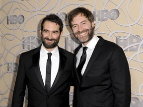 FILE - In this Jan. 8, 2017 file photo, Indie filmmakers Jay Duplass, left, and Mark Duplass arrive at the HBO Golden Globes afterparty in Beverly Hills, Calif. The brothers have written a memoir called "Like Brothers." It mixes autobiography, movie-making advice, observational comedy, old scripts and emails, and tips on keeping friendships in business.