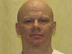 FILE - This undated file photo provided by the Ohio Department of Rehabilitation and Correction shows death row inmate Robert Van Hook, convicted of the fatal 1985 strangling and stabbing of David Self, a man he met in a bar in Cincinnati. Attorneys for a condemned killer are asking that their client be spared, saying he experienced a "homosexual panic" of self-revulsion before killing the man he picked up at the Ohio bar. The Ohio Parole Board is scheduled to hear arguments on Thursday, May 24, 2018, for and against Van Hook's clemency request.