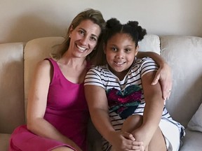 In this May 2, 2018, photo provided by Alana Brown, Slate Ridge fourth-grade teacher Tanya Thomas, left, and Alana's daughter Eva Evans, a Slate Ridge student, pose for a photo in Reynoldsburg, Ohio. Thomas is donating a kidney to save the life of Eva Evans.