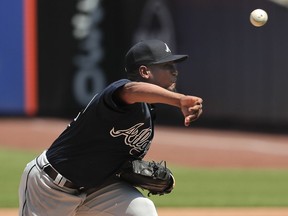 Atlanta Braves starting pitcher Julio Teheran delivers against the New York Mets during the first inning of a baseball game, Thursday, May 3, 2018, in New York.