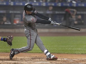 Arizona Diamondbacks' John Ryan Murphy connects for a two-run home run against the New York Mets during the fourth inning of a baseball game, Saturday, May 19, 2018, in New York.