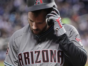 Arizona Diamondbacks' Steven Souza Jr. pulls off his batting helmet after striking out against the New York Mets during the fourth inning of a baseball game, Friday, May 18, 2018, in New York.