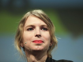 FILE- In this May 2, 2018, file photo, Chelsea Manning attends a discussion at the media convention "Republica" in Berlin. A close friend and colleague of Chelsea Manning said Monday, May 28, that the convicted leaker of government secrets and longshot candidate for U.S. Senate is safe after a photo on her Twitter account apparently showed the 30-year-old woman standing on the edge of an upper-story window ledge.