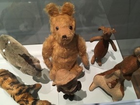 This May 29, 2018 photo shows toys made by the Teddy Toy Company around 1930 and are early examples of Winnie-the-Pooh merchandise. Atlanta's High Museum of Art is hosting an exhibition called "Winnie-the-Pooh: Exploring a Classic" from June 3 to Sept. 2, 2018.