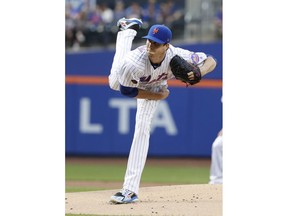 New York Mets' Jacob deGrom watches a pitch during the first inning of the team's baseball game against the Atlanta Braves on Wednesday, May 2, 2018, in New York.