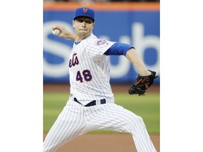 New York Mets' Jacob deGrom delivers a pitch during the first inning of a baseball game against the Miami Marlins Wednesday, May 23, 2018, in New York.