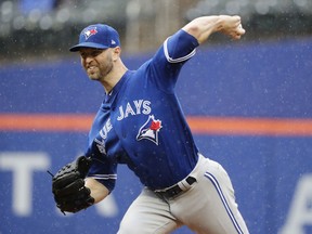 Toronto Blue Jays' J.A. Happ delivers a pitch during the first inning of a baseball game against the New York Mets, Wednesday, May 16, 2018, in New York.