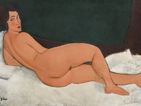 This 1917 oil painting, "Nu couche (sur le cote gauche)" by Amedeo Modigliani, was auctioned at Sotheby's in New York for more than $157 million, in their Impressionist & Modern Art evening sale Monday, May 14, 2018. Sotheby's says the painting had the highest pre-auction estimate for an artwork at $150 million. (Sotheby's via AP)