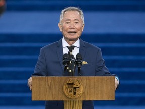 FILE - In this Saturday, July 1, 2017, file photo, actor George Takei introduces Los Angeles Mayor Eric Garcetti at a swearing-in ceremony at Los Angeles City Hall. Takei is scheduled to speak Tuesday, May 8, 2018, at the Boston Public Library to discuss his experience during World War II spent in U.S. internment camps for Japanese-Americans.