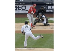 New York Yankees starting pitcher Masahiro Tanaka (19) strikes out Los Angeles Angels designated hitter Shohei Ohtani during the first inning of a baseball game Sunday, May 27, 2018, at Yankee Stadium in New York.