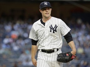 New York Yankees' Sonny Gray reacts heads to the dugout during the second inning of the team's baseball game against the New York Yankees on Friday, May 11, 2018, in New York.