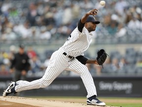 New York Yankees starting pitcher Domingo German delivers during the first inning of a baseball game against the Cleveland Indians in New York, Sunday, May 6, 2018.