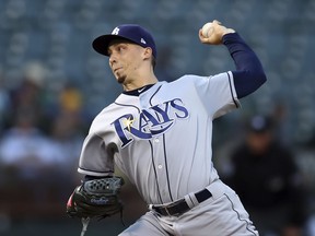 Tampa Bay Rays pitcher Blake Snell throws to an Oakland Athletics batter during the first inning of a baseball game Tuesday, May 29, 2018, in Oakland, Calif.