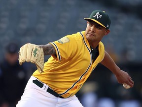 Oakland Athletics pitcher Sean Manaea works against the Tampa Bay Rays during the first inning of a baseball game Wednesday, May 30, 2018, in Oakland, Calif.