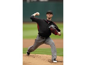 Arizona Diamondbacks starting pitcher Clay Buchholz  delivers against the Oakland Athletics during the first inning of a baseball game, Saturday, May 26, 2018, in Oakland, Calif.