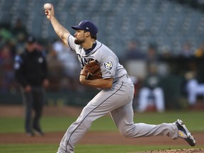 Tampa Bay Rays pitcher Nathan Eovaldi works against the Oakland Athletics during the first inning of a baseball game Wednesday, May 30, 2018, in Oakland, Calif.