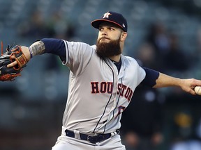 Houston Astros pitcher Dallas Keuchel works against the Oakland Athletics during the first inning of a baseball game Monday, May 7, 2018, in Oakland, Calif.
