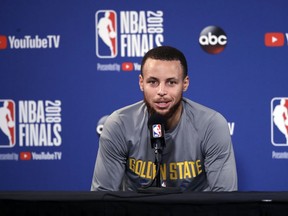 Golden State Warriors' Stephen Curry answers questions after an NBA basketball practice, Wednesday, May 30, 2018, in Oakland, Calif. The Warriors face the Cleveland Cavaliers in Game 1 of the NBA Finals on Thursday in Oakland.