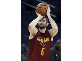 Cleveland Cavaliers' Kevin Love shoots during an NBA basketball practice, Wednesday, May 30, 2018, in Oakland, Calif. The Cavaliers face the Golden State Warriors in Game 1 of the NBA Finals on Thursday in Oakland.