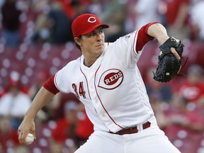 Cincinnati Reds starting pitcher Homer Bailey throws during the first inning of the team's baseball game against the Milwaukee Brewers, Tuesday, May 1, 2018, in Cincinnati.