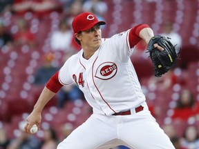 Cincinnati Reds starting pitcher Homer Bailey throws in the first inning of a baseball game against the New York Mets, Monday, May 7, 2018, in Cincinnati.