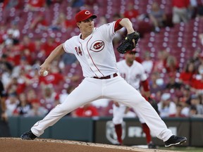 Cincinnati Reds starting pitcher Homer Bailey throws during the first inning of the team's baseball game against the Pittsburgh Pirates, Wednesday, May 23, 2018, in Cincinnati.