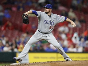 Chicago Cubs starting pitcher Jon Lester throws during the second inning of a baseball game against the Cincinnati Reds, Friday, May 18, 2018, in Cincinnati.