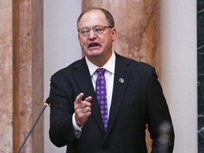 FILE – In this Jan. 8, 2018, file photo, Kentucky House Speaker Jeff Hoover resigns from his leadership position during a speech at the State Capitol in Frankfort, Ky. Midterm resignations of legislative leaders in 2018, including Hoover's resignation as state House Speaker, have caused lawmaking to stall in Ohio, a lawsuit in Kentucky and left some residents unrepresented in Massachusetts.