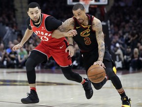 Cleveland Cavaliers' George Hill (3) drives on Toronto Raptors' Fred VanVleet (23) during the first half of Game 3 of an NBA basketball second-round playoff series Saturday, May 5, 2018, in Cleveland.
