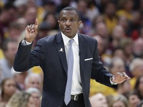 Toronto Raptors head coach Dwane Casey gestures against the Cleveland Cavaliers in the first half of Game 4 of an NBA basketball second-round playoff series, Monday, May 7, 2018, in Cleveland.