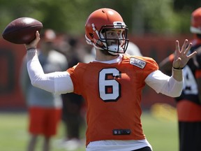 Cleveland Browns quarterback Baker Mayfield throws during a practice at the NFL football team's training camp facility, Wednesday, May 23, 2018, in Berea, Ohio.