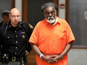 FILE - In this March 8, 2018, file photo, convicted killer Nathaniel Cook leaves Lucas County Common Pleas Court in Toledo, Ohio. Attorneys for Cook, who confessed to a string of rapes and murders with his brother and now wants to be released from an Ohio prison, say a plea deal signed nearly 20 years ago forces the court to order his release this year. A judge plans to hold a hearing Thursday, May 31, in Toledo, when she could decide whether to free Cook.